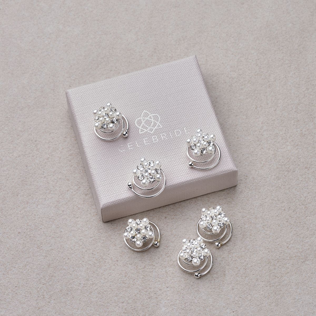 Riccioli con perle bianche e strass