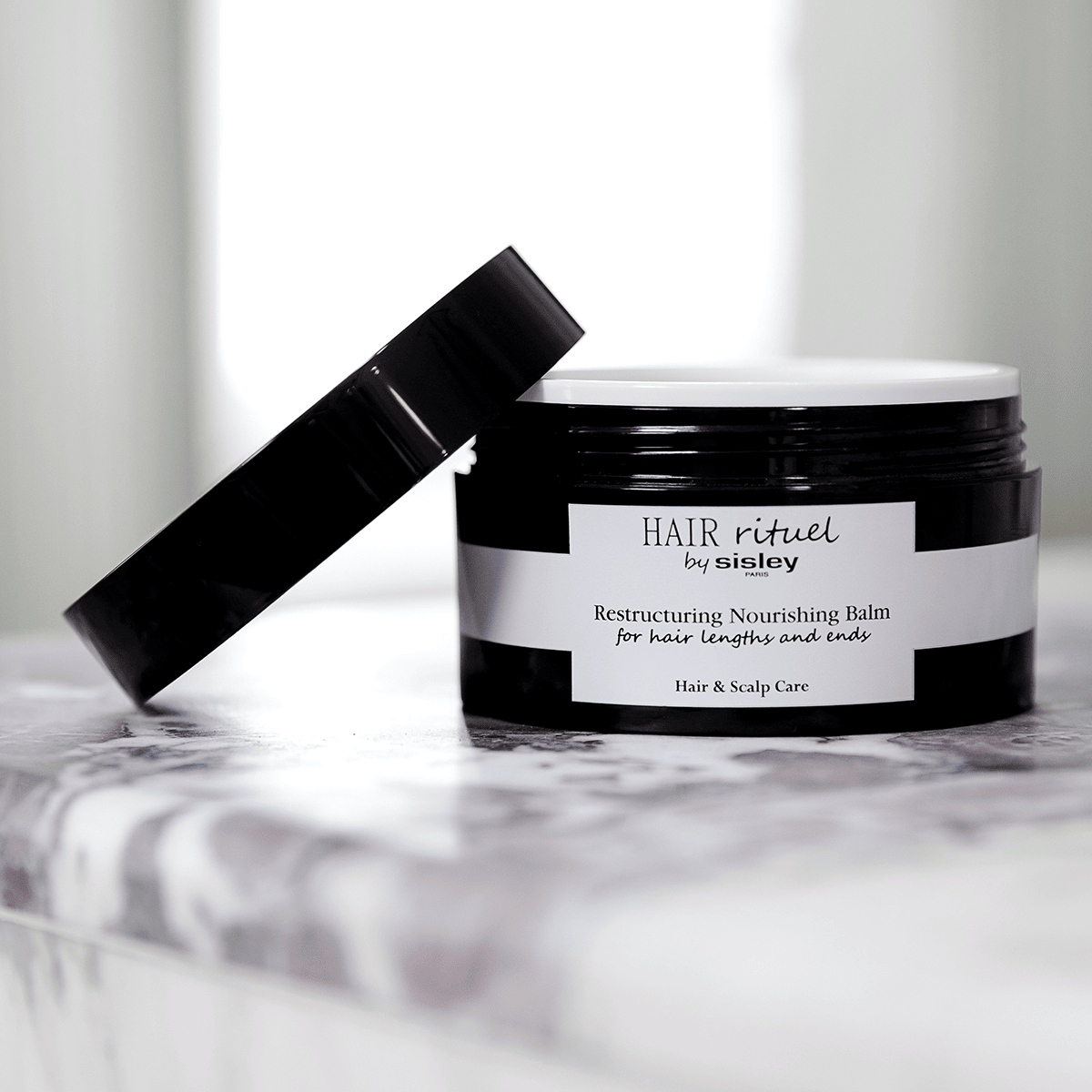 Le Baume Restructurant Nourrissant pour les longueurs et les pointes